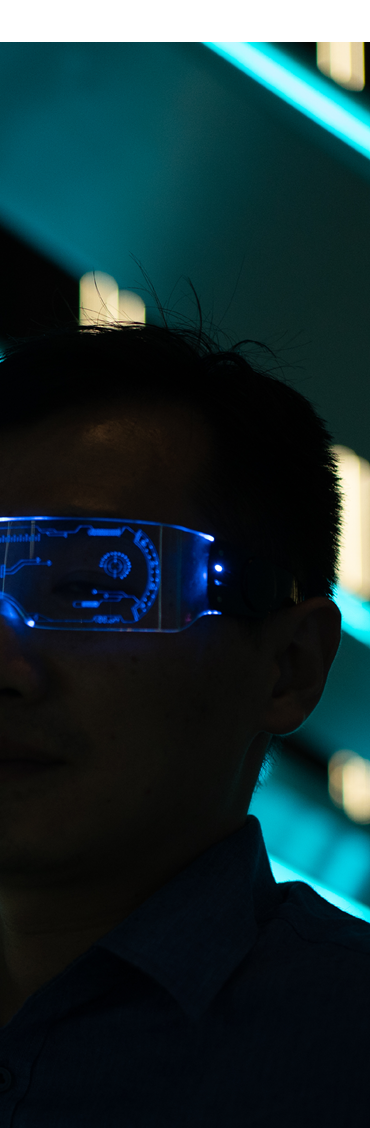 Asian man using virtual reality glasses