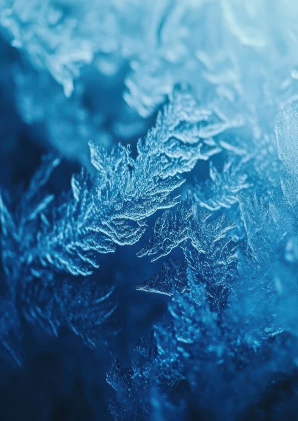 Artistic close-up of frosty window patterns illuminated by soft blue light, capturing intricate icy textures in a magical winter theme