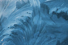 frosty natural pattern and sun on winter window