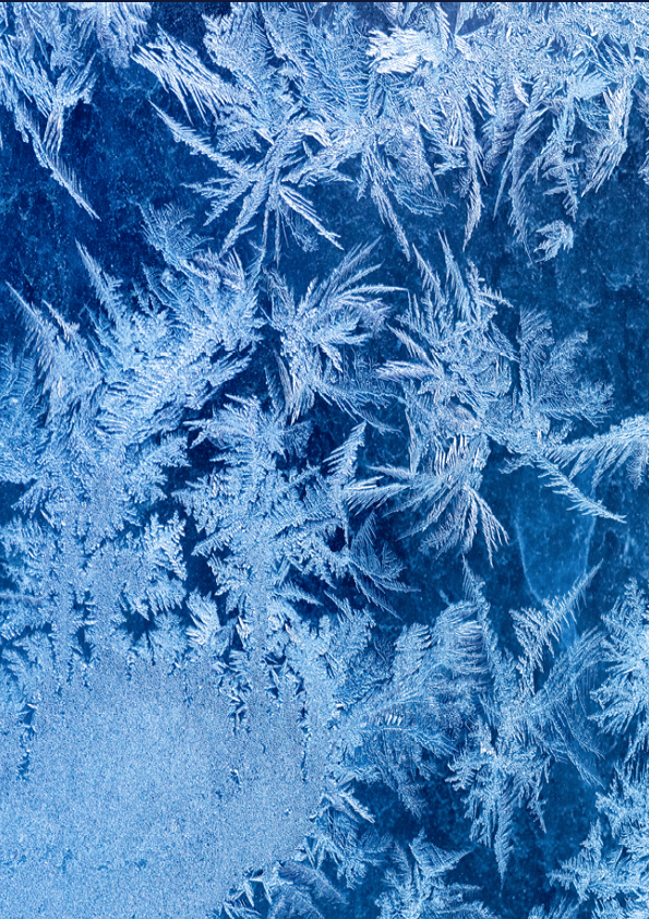 Frosty winter pattern at a window glass, macro texture