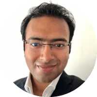 A man wearing a suit and tie. Description generated by AI