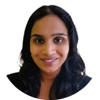 A woman with long hair and a smile on her face. Description generated by AI