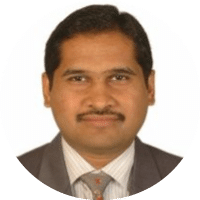 A man wearing a gray suit and tie. Description generated by AI