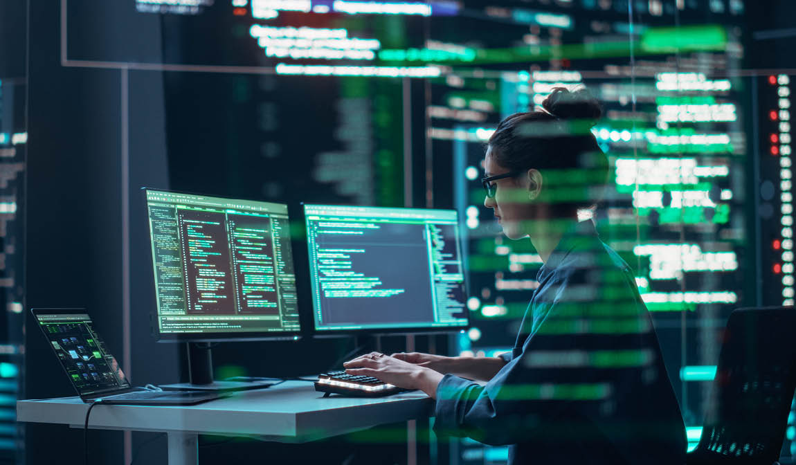 Female Programmer Working in Monitoring Control Room, Surrounded by Big Screens Displaying Lines of Programming Language Code. Portrait of Woman Creating a Software. Abstract Futuristic Coding Concept